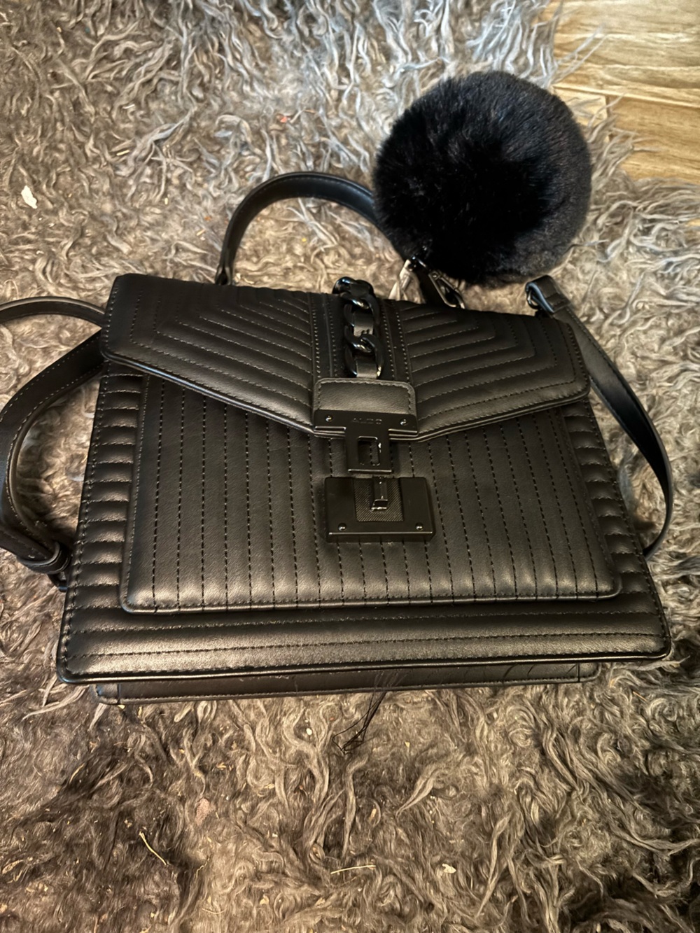 Aldo Black Quilted Crossbody Bag with Pom Pom Charm